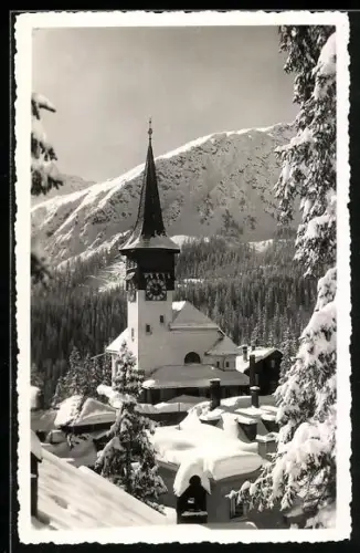 AK Arosa, Dorfkirche im Winter