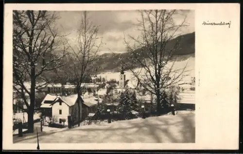 AK Mürzzuschlag, Teilansicht mit Kirche im Winter