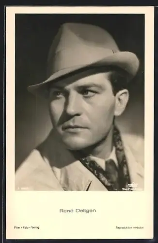 AK Schauspieler Rene Deltgen, im Mantel mit Hut gesehen