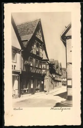 AK Aalen /Wttbg., Hirschgasse mit Geschäftshaus, Strassenpartie