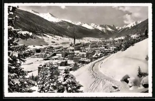 AK Davos, Ortsansicht im Winter von der Höhenpromenade gegen Tinzenhorn