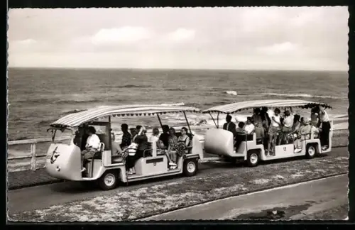 AK Norderney, Urlaubergruppen in Wägen des Strandexpresses