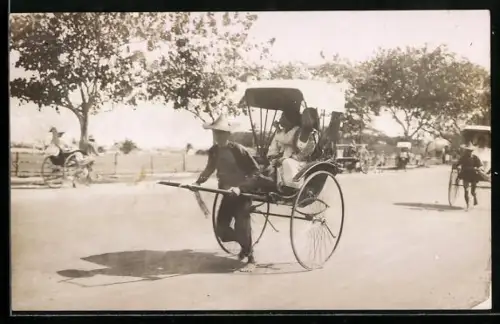 Foto-AK Rikschafahrer auf der Strasse