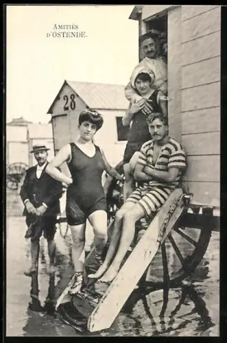 AK Ostende, Gruppe in Badeanzügen und Anzugträger an einem Badewagen