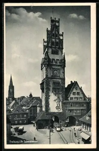 AK Freiburg i. Br., Schwabentor, Strassenbahn bei der Durchfahrt