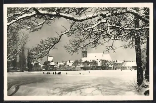 AK Grimmen, Teilansicht mit Kirche im Winter
