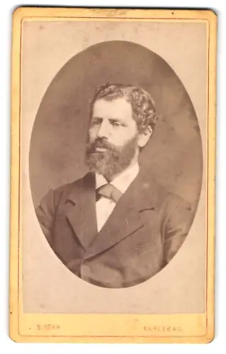Fotografie S. Kohn, Karlsbad, Porträt eines Mannes mit Bart