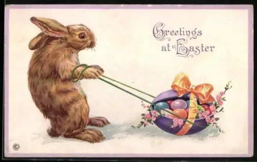 AK Osterhase zieht bunte Ostereier hinter sich her