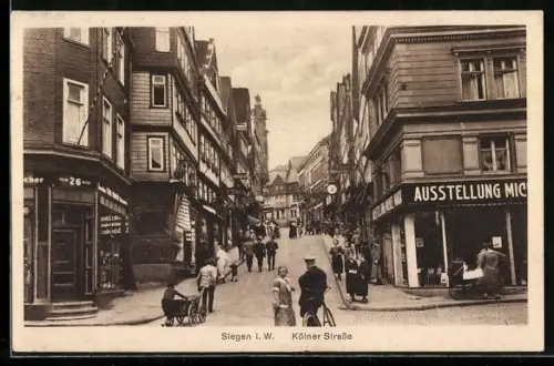 AK Siegen i. W., Partie an der Kölner Strasse mit Ausstellung von Michel Marx