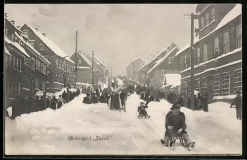 AK Clausthal, Bewohner Rodeln in der verschneiten Strasse