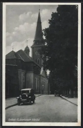 AK Soltau /Lüneburger Heide, Strassenpartie mit Kirche