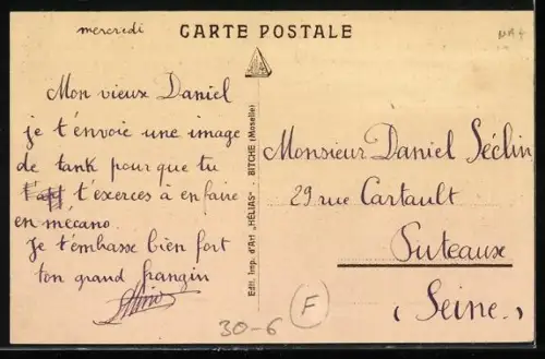 AK Panzer steht auf einer Wiese