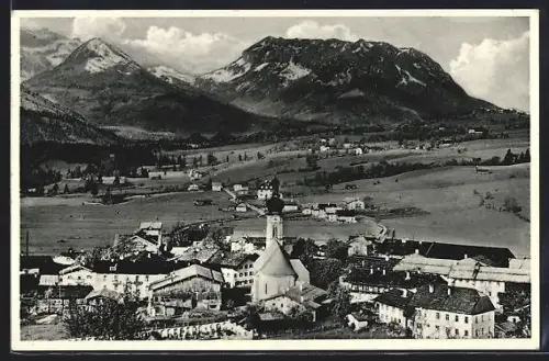 AK Reit i. Winkl, Ortsansicht mit Kaisergebirge