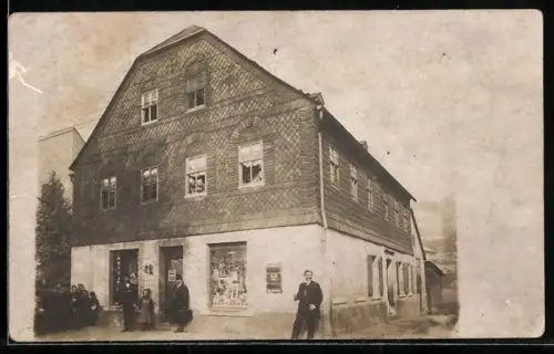 Foto-AK Niederhasslau, Geschäft von Gustav Heinz