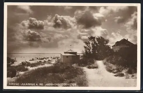 AK Juliusruh a. Rg., Strand mit Dünen und abziehendem Gewitter