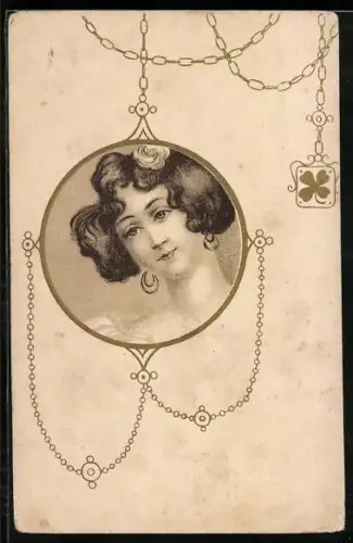 AK Portrait einer hübschen dunkelhaarigen Dame mit Ohrringen an einer Kette mit einem Kleeblatt, Jugendstil