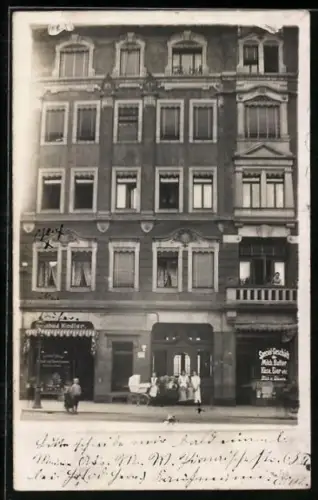 Foto-AK Dresden, Partie in der Pirnaische Strasse 63 mit Geschäft von Reinhold Kindler