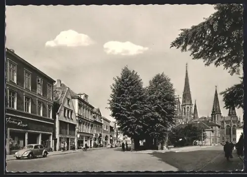 AK Oldenburg /Oldb., Schlossplatz, Warenhaus und Kirchtürme