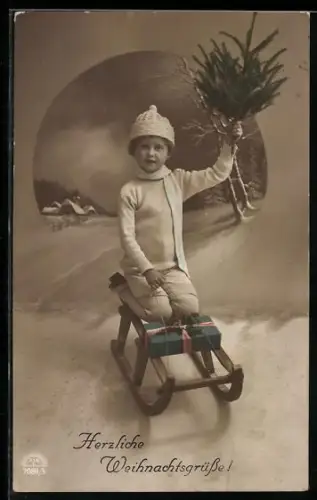 AK Kind sitzt auf einem Schlitten