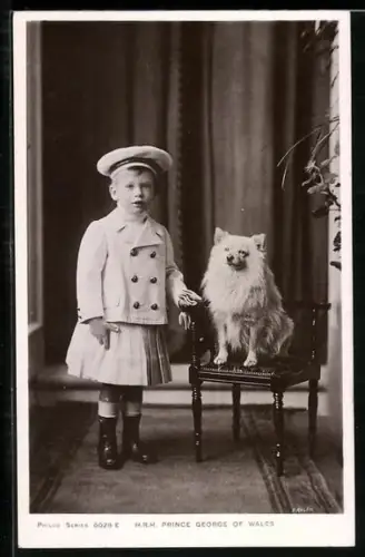AK Prince George of Wales next to a dog