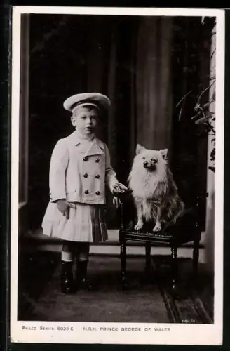AK Prince George of Wales next to a dog
