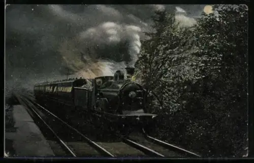 AK Britische Lokomotive mit Kohlentender und Personenzug bei nächtlicher Fahrt, englische Eisenbahn