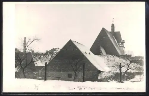 Foto-AK Zörbig, Kirche und verschneite Häuser