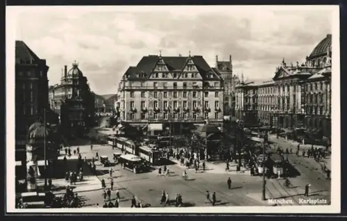 AK München, Karlsplatz mit Geschäften und Strassenbahn