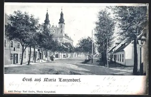 AK Maria Lanzendorf, Strasse mit Kirche