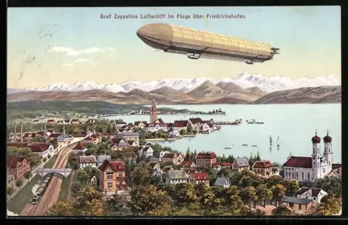 AK Friedrichshafen, Graf Zeppelins Luftschiff über der Stadt, Eisenbahn