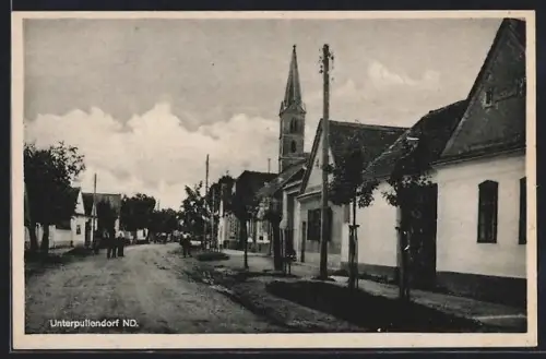 AK Unterpullendorf /ND., Strasse mit Kirche