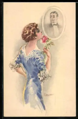 Künstler-AK Luis Usabal: Attraktive Dame betrachtet das Portrait eines Herren