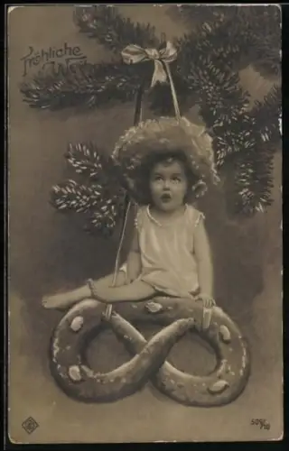 AK Kleines Mädchen auf Lebkuchen-Brezel am Weihnachtsbaum