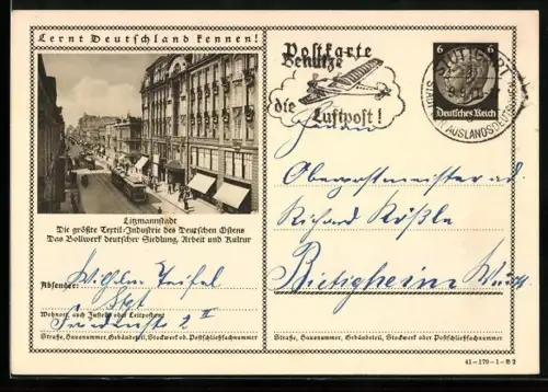 AK Litzmannstadt, Strassenpartie mit Strassenbahn, Ganzsache Lernt Deutschland kennen