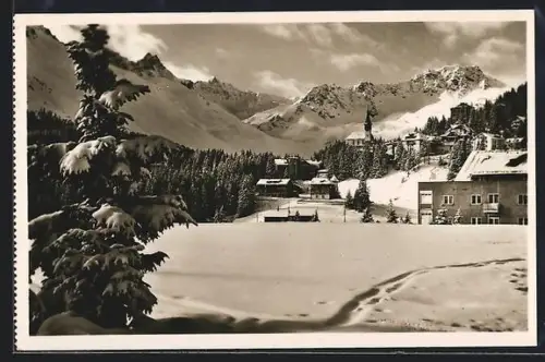 AK Arosa, Teilansicht mit Gebirgspanorama