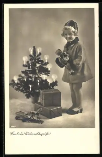 AK Mädchen mit Puppe am Weihnachtsbaum