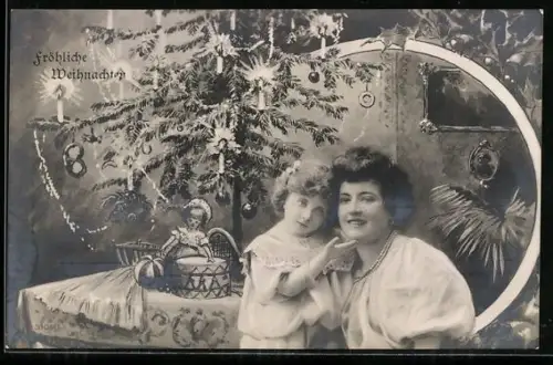 AK Weihnachten, Frau mit Kind, Puppe unter einem Weihnachtsbaum, gerahmte Ansicht, Zweige