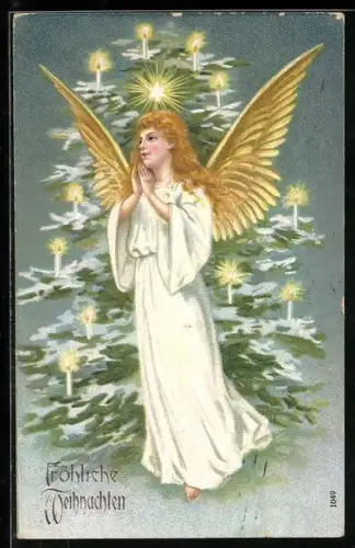 AK Hübscher Weihnachtsengel beim Gebet vor einem leuchtenden Weihnachtsbaum