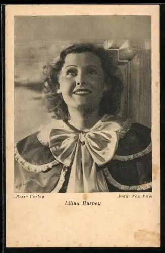AK Schauspielerin Lilian Harvey mit offenen Haaren und glücklichem Lächeln