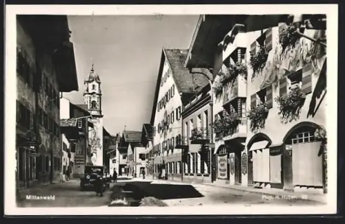 AK Mittenwald, Ortsansicht mit Bäckerei und Kirchturm