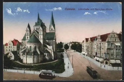 AK Coblenz, Löhrstrasse mit Herz-Jesu-Kirche und Strassenbahn