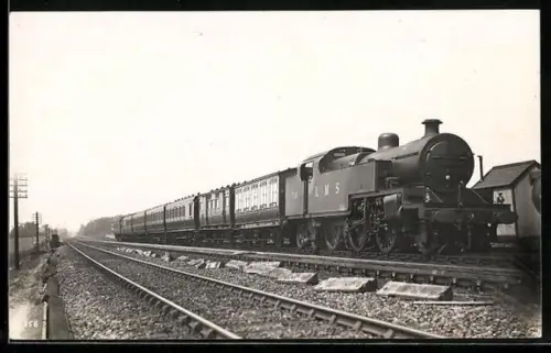AK Britische Lokomotive Nr. 2316 der LMS mit sieben Personenwaggons, englische Eisenbahn