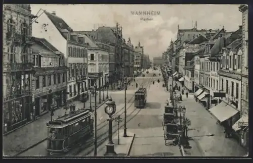 AK Mannheim, Planken, Strassenbahn, Uhr, Geschäftsgebäude