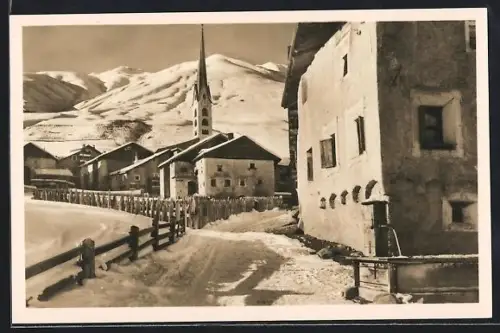 AK Zuoz, Teilansicht mit Kirche im Schnee