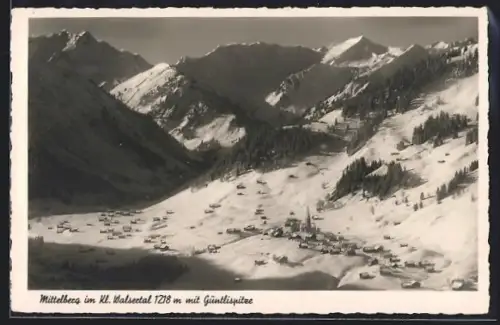 AK Mittelberg /Kl. Walsertal, Gesamtansicht mit Güntlispitze im Winter