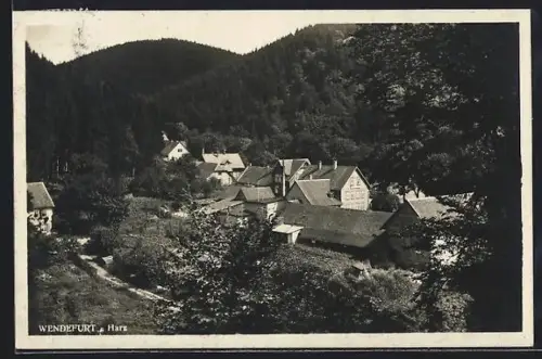 AK Wendefurt /Harz, Ortsansicht mit bewaldeten Hügeln