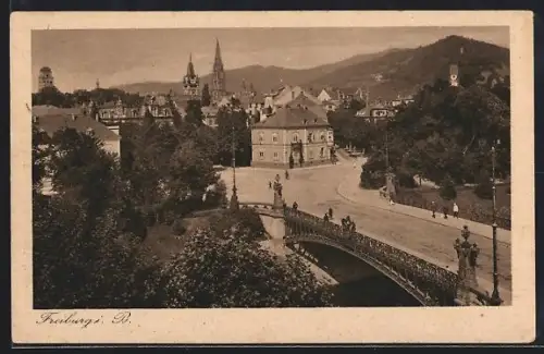 AK Freiburg i. B., Ortsansicht mit Brücke