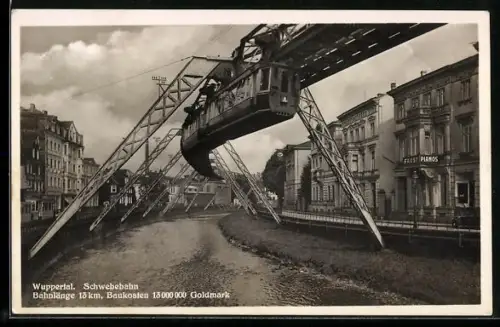 AK Wuppertal, Strassenpartie mit Piano-Geschäft Faust und Schwebebahn