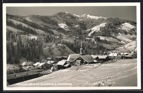 AK Mühlbach am Hochkönig, Winterpanorama mit Kirche und Schneeberg