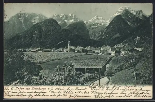 AK Lofer, Ortspanorama mit Kirche und Steinbergen